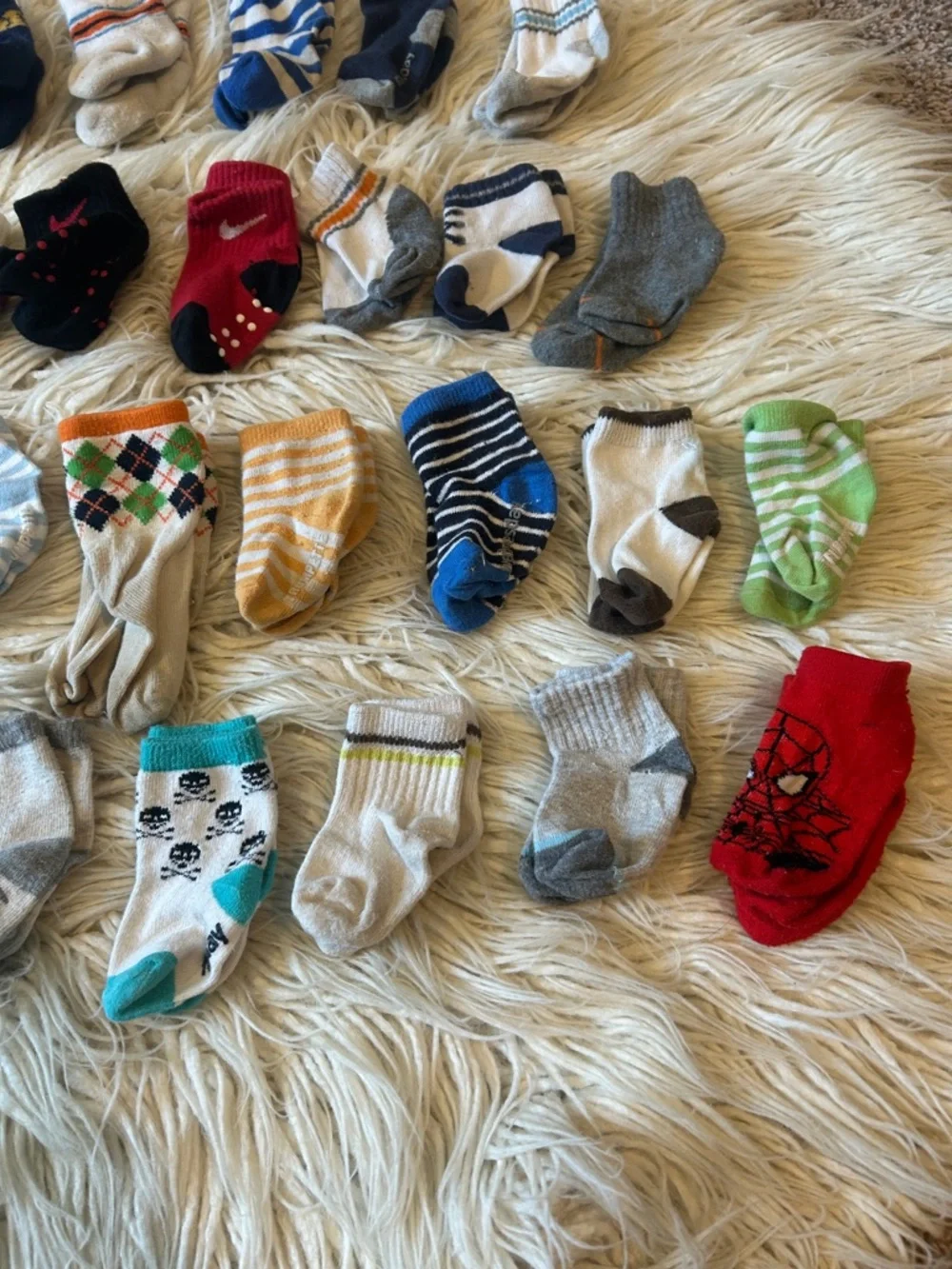 Baby sock lot of diff size med to 12 month-ish Assortment - 31 pairs